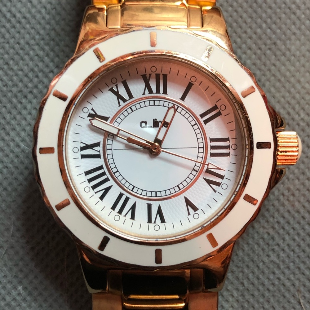 A_line Unisex Marina White Dial Gold band Watch.